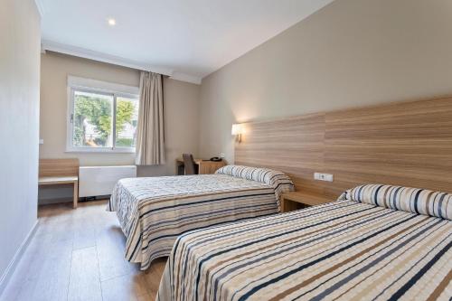 Habitación Doble - 1 o 2 camas del hotel Best Osuna Feria Madrid. Foto 1