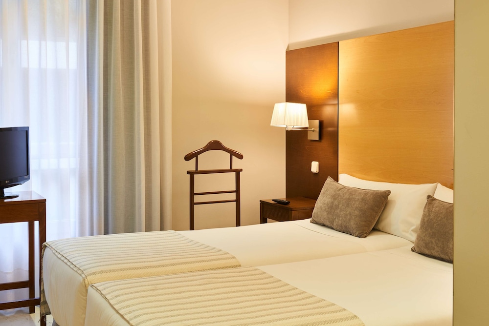 Habitación Triple del hotel Barrio De Salamanca Suites