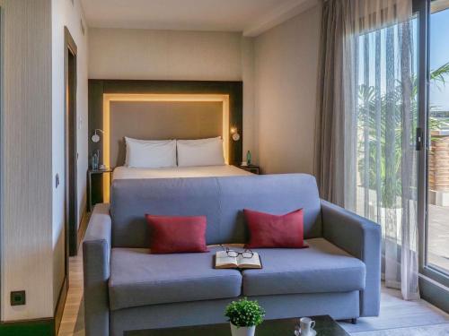 Habitación Executive con terraza del hotel Novotel Madrid Center. Foto 10