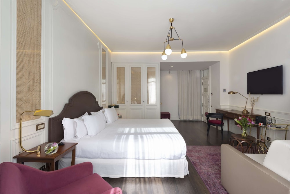 HABITACIÓN GRAND DELUXE REINA del hotel H10 Villa De La Reina Boutique. Foto 3