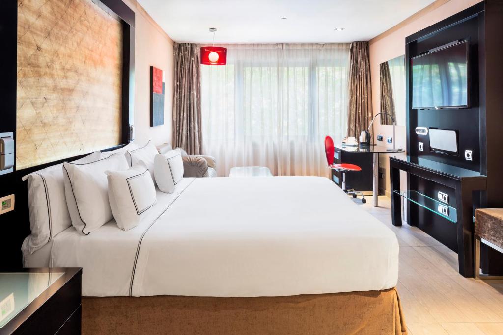 Habitación familiar del hotel Melia Madrid Princesa. Foto 1