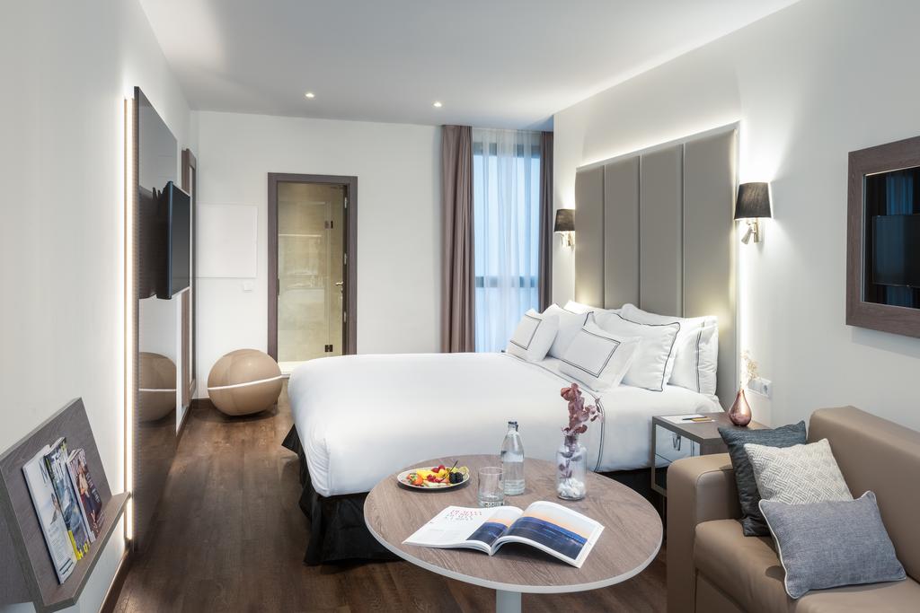 Habitación familiar del hotel Melia Madrid Serrano