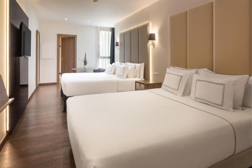 Habitación Familiar del hotel Melia Madrid Serrano