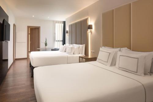 Habitación Familiar del hotel Melia Madrid Serrano. Foto 3