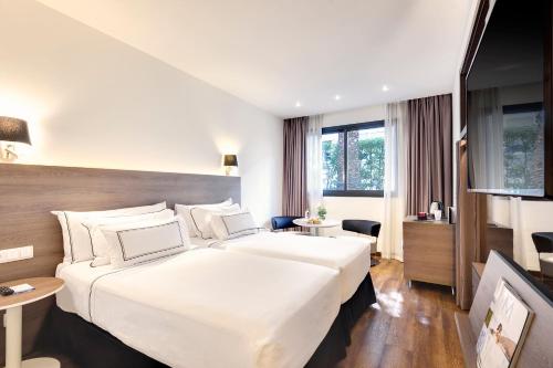 Habitación Meliá con vistas al patio - jardín del hotel Melia Madrid Serrano
