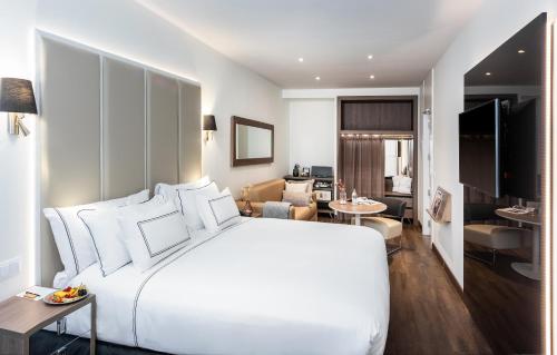 Habitación Familiar del hotel Melia Madrid Serrano. Foto 11
