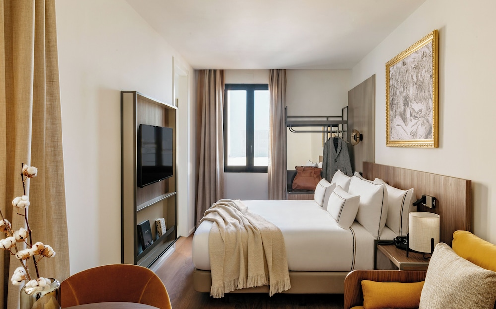 Superior Connected Triple Rooms del hotel Casa de Las Artes, member of Meliá Collection. Foto 1