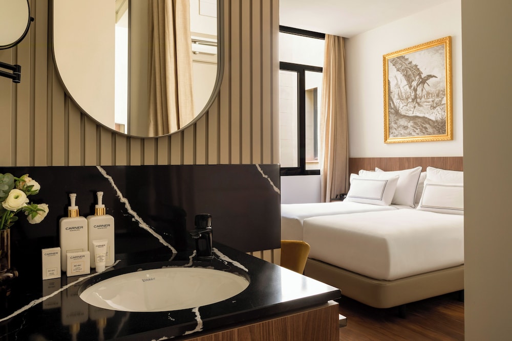 Superior Connected Triple Rooms del hotel Casa de Las Artes, member of Meliá Collection. Foto 13