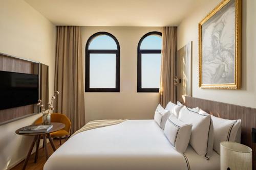 The Artist Junior Suite con Terraza y Vistas Urbanas del hotel Casa de Las Artes, member of Meliá Collection. Foto 4