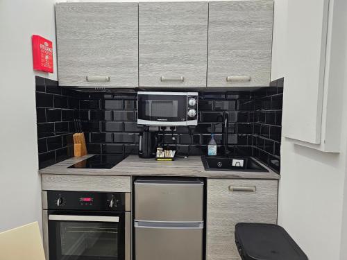 Habitación Doble - 2 camas del hotel London Stay Apartments. Foto 3