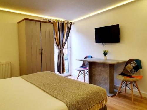 Habitación Doble Económica del hotel London Stay Apartments. Foto 4