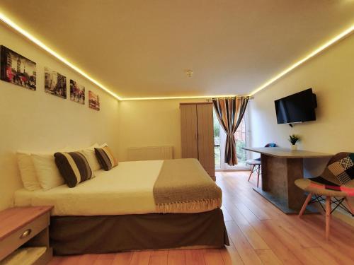 Habitación Doble Económica del hotel London Stay Apartments. Foto 6