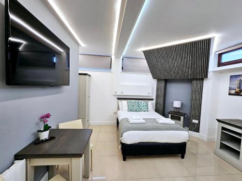 Habitación Doble del hotel London Stay Apartments. Foto 9