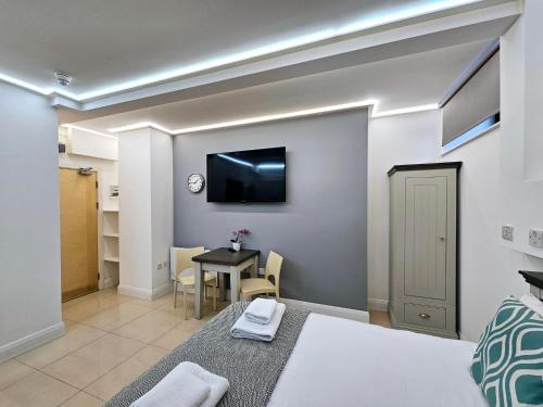 Habitación Doble del hotel London Stay Apartments. Foto 10