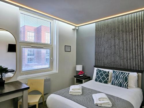 Habitación Doble del hotel London Stay Apartments. Foto 14