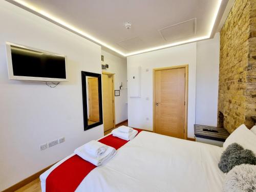 Habitación Doble del hotel London Stay Apartments. Foto 17