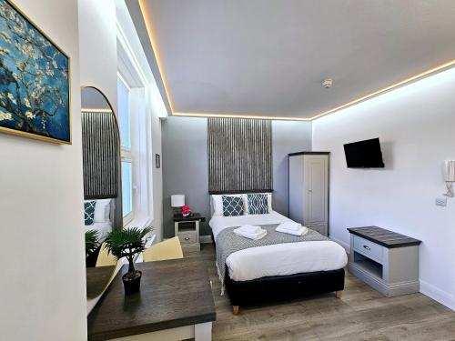 Habitación Doble del hotel London Stay Apartments. Foto 18