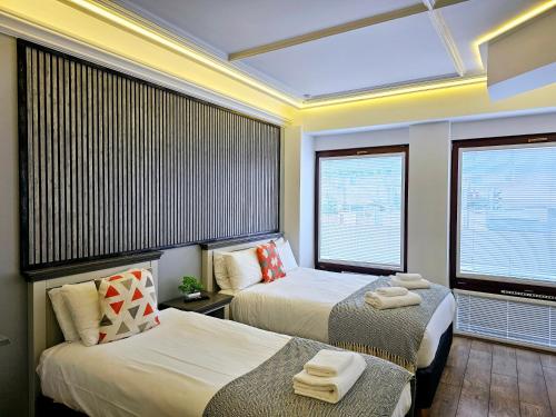 Habitación Triple del hotel London Stay Apartments. Foto 5