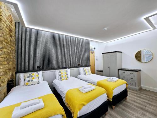 Habitación Triple del hotel London Stay Apartments. Foto 12