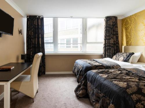 Habitación Doble Estándar - 2 camas del hotel Stuart. Foto 5