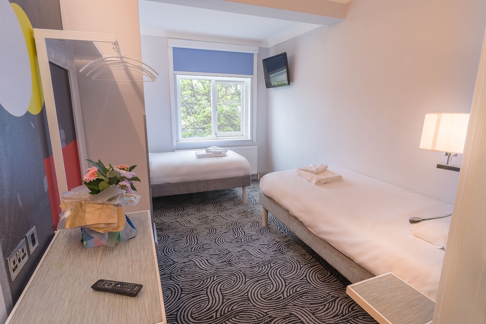 Habitación con 2 camas individuales del hotel Victoria Inn