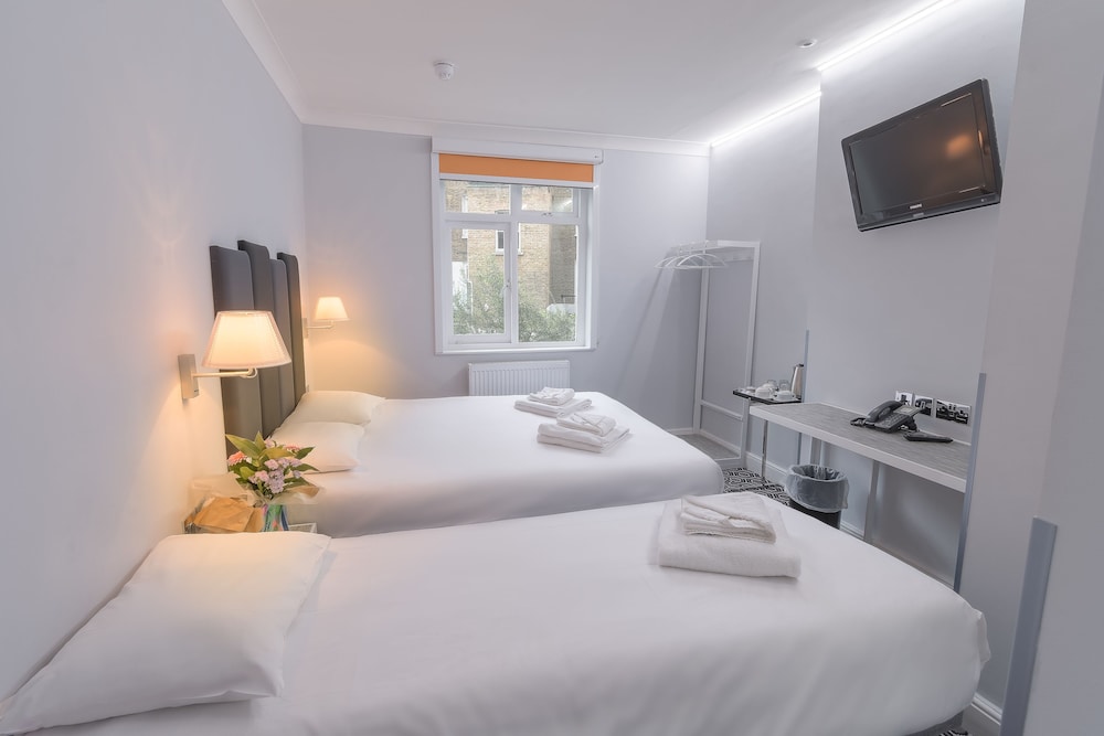 Habitación triple del hotel Victoria Inn. Foto 3