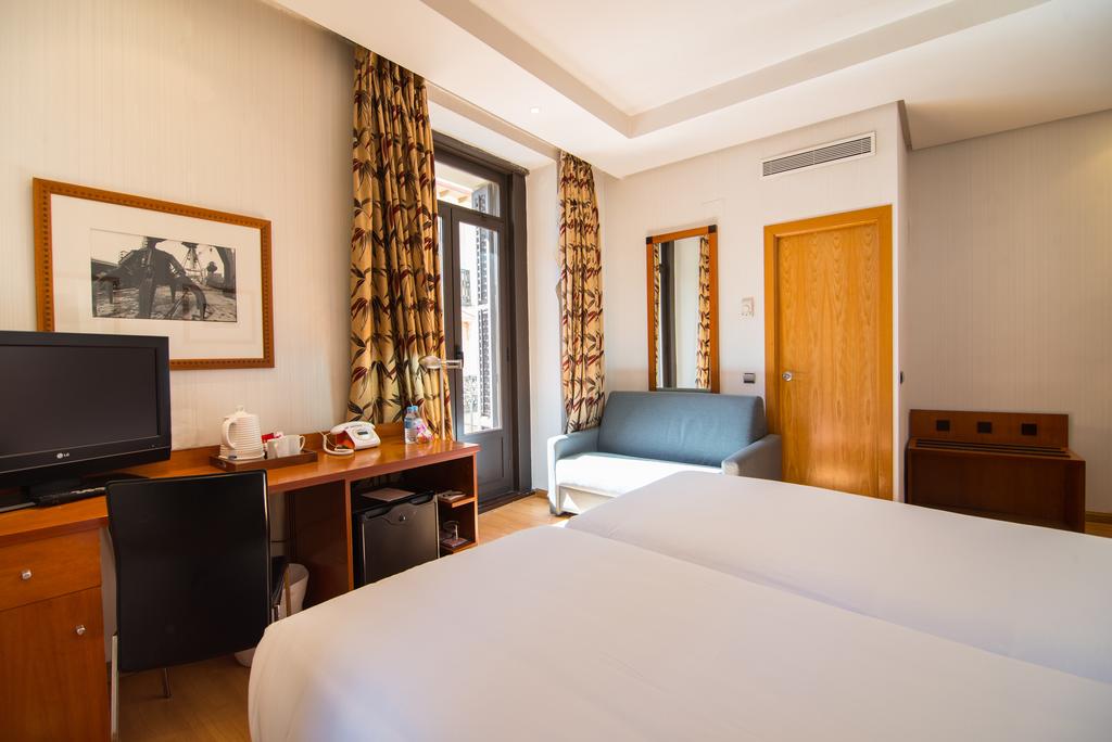 Habitación doble Vista ciudad del hotel Petit Palace Preciados. Foto 1