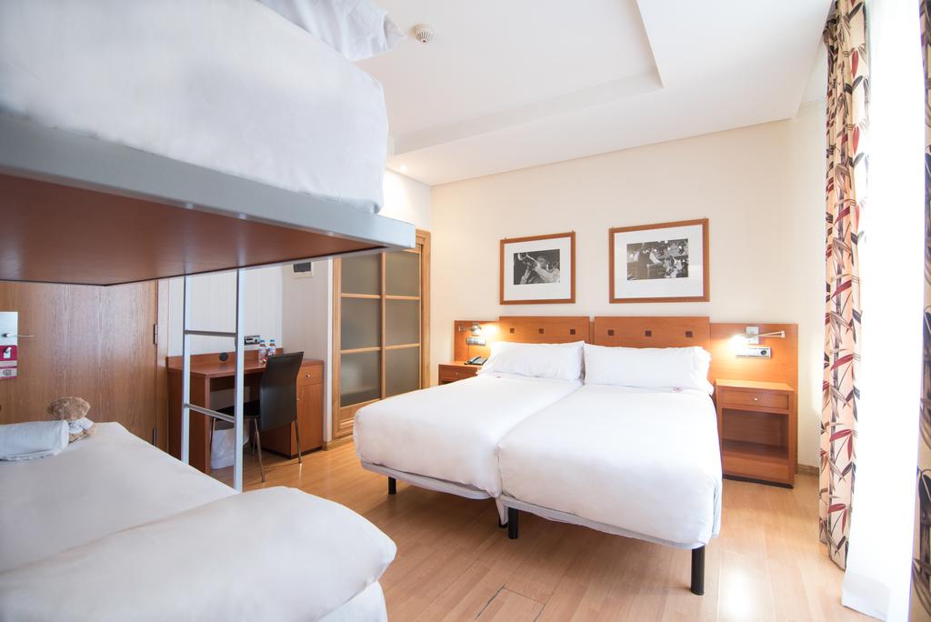 Habitación cuádruple del hotel Petit Palace Preciados