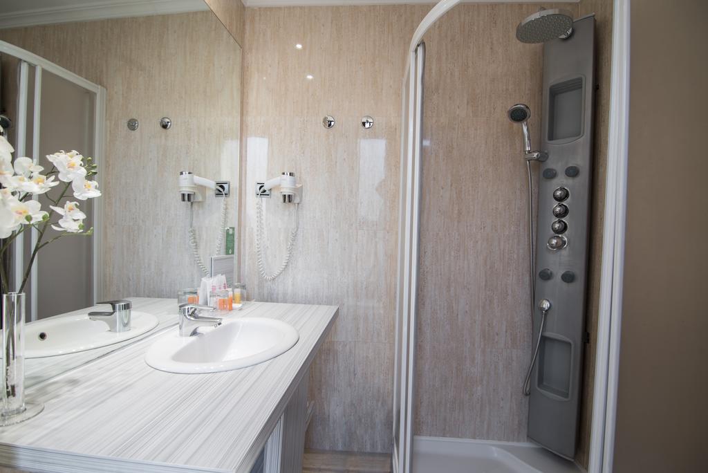 Habitación cuádruple del hotel Petit Palace Preciados. Foto 2