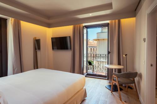Habitación Doble con vistas del hotel Petit Palace Preciados. Foto 7