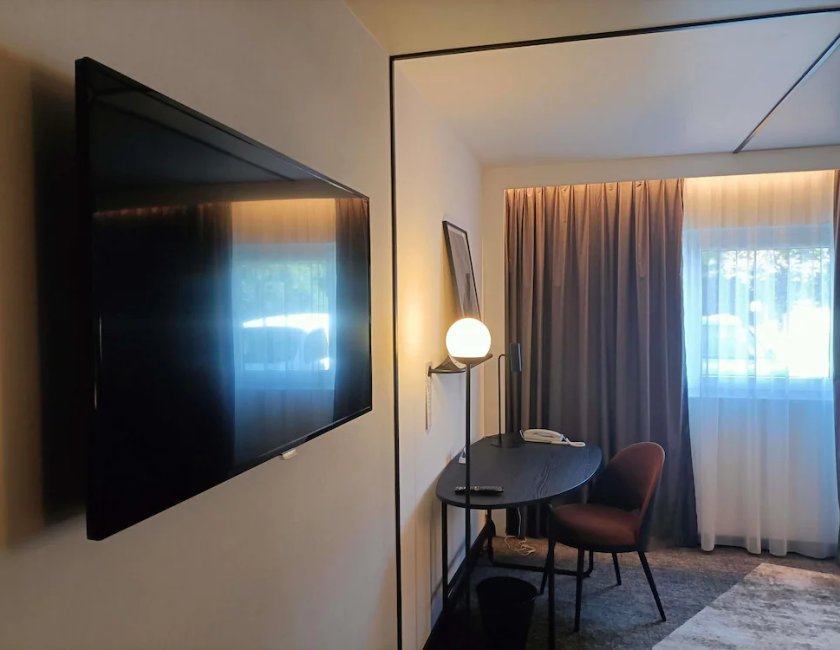 Habitación Ejecutiva - 1 cama doble y 1 sofá - cama individual del hotel Novotel Reims Tinqueux. Foto 8