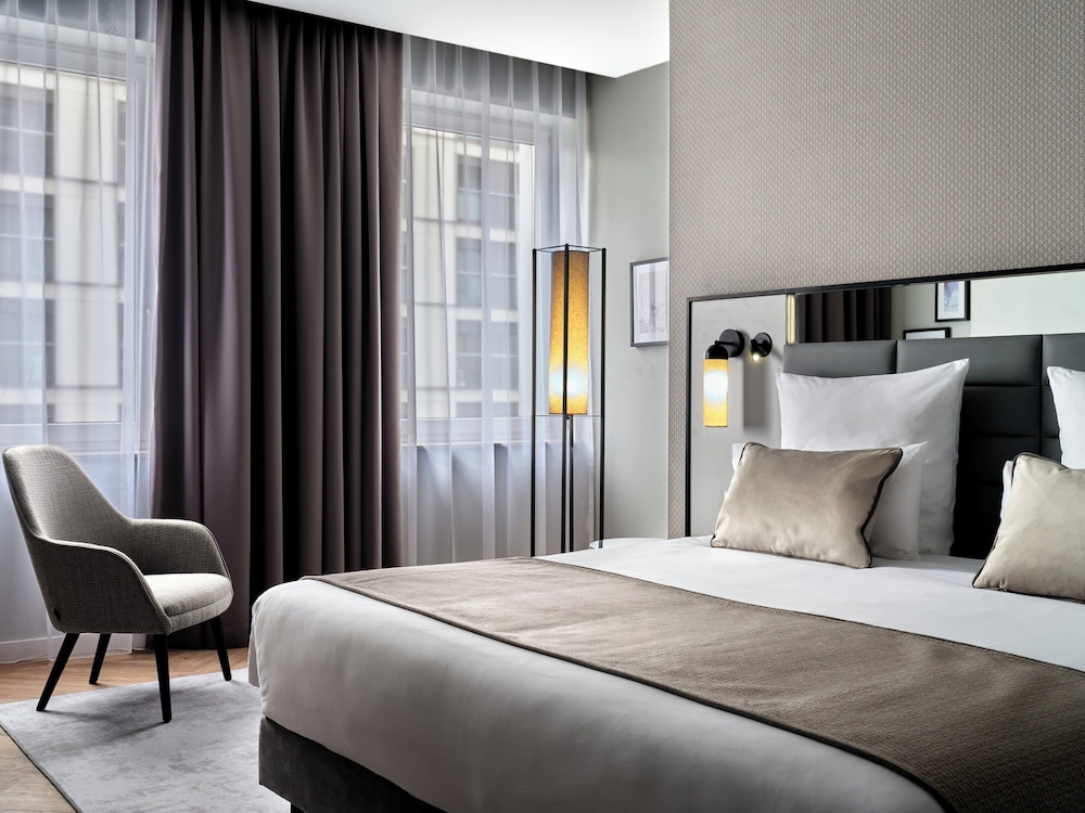 Habitación Confort con 2 camas individuales del hotel Leonardo Royal Warsaw. Foto 1