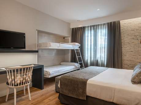 Habitación familiar del hotel Catalonia Gran Via Madrid. Foto 1