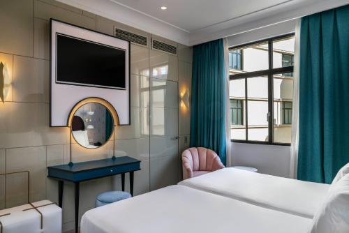 Habitación Doble Básica del hotel Vincci Capitol. Foto 5