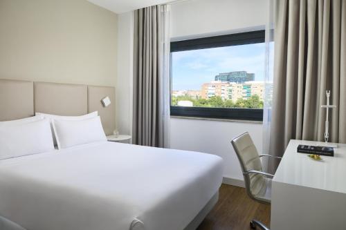 Habitación Familiar Comunicada con cama supletoria del hotel Nh Madrid Ventas