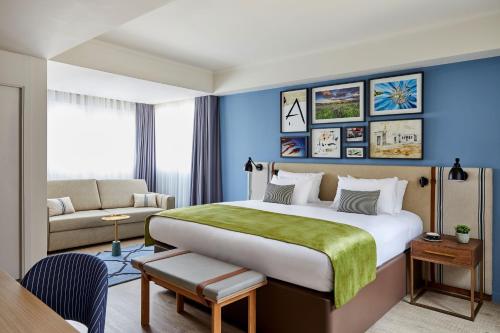 Habitación doble Premium Sofá Cama incluido 2 Camas individuales del hotel Indigo Madrid - Princesa, An Ihg. Foto 3