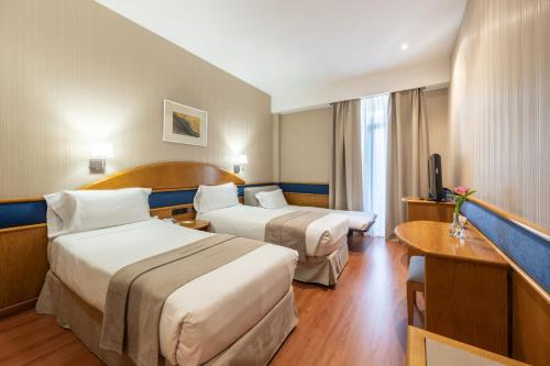 Habitación Triple del hotel Agumar. Foto 1