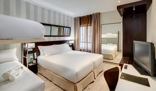 Habitación Cuádruple del hotel Sercotel Madrid Aeropuerto