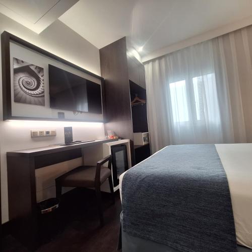 Habitación doble/individual básica del hotel Gran Versalles. Foto 3