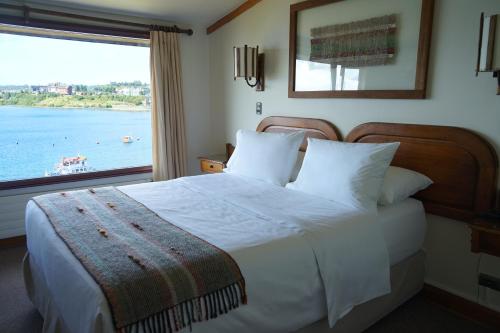 Habitación Doble Estándar del hotel Cabaña Del Lago Puerto Varas. Foto 3