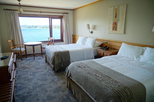 Habitación Doble Superior - 2 camas del hotel Cabaña Del Lago Puerto Varas. Foto 3