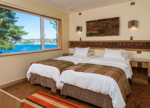 Cabaña Eco - 2 camas individuales del hotel Cabaña Del Lago Puerto Varas. Foto 1