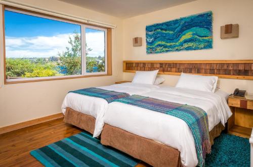Cabaña Eco - 2 camas individuales del hotel Cabaña Del Lago Puerto Varas. Foto 2