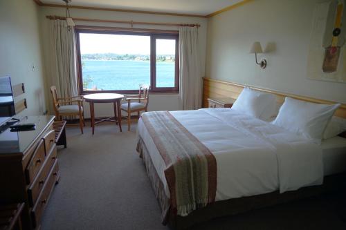Habitación Doble Superior del hotel Cabaña Del Lago Puerto Varas. Foto 7