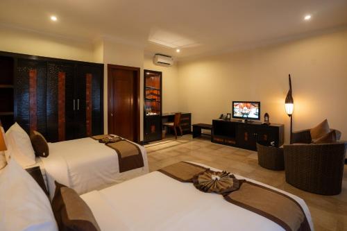 Island Bungalow Twin del hotel Ombak Sunset. Foto 5