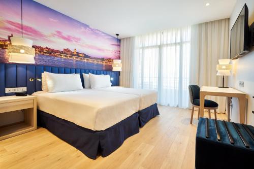 Habitación Doble con cama supletoria - 2 camas del hotel Eurostars Astoria. Foto 4