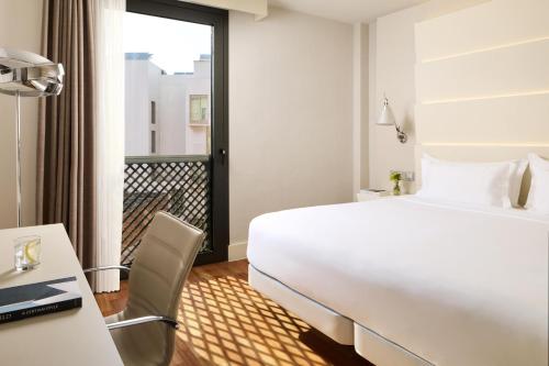 Habitación familiar Comunicada Normal del hotel NH Malaga. Foto 3