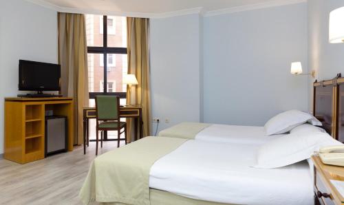 Habitación Triple del hotel Don Curro. Foto 9