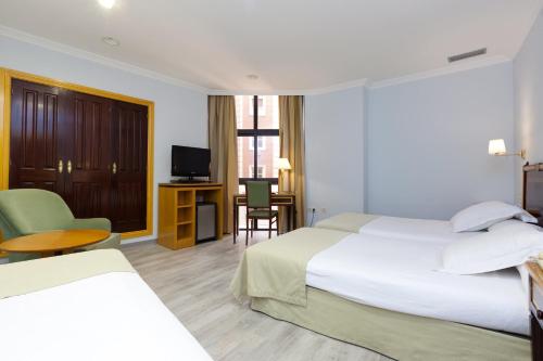 Habitación Cuádruple del hotel Don Curro. Foto 6