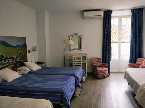Habitación Cuádruple con balcón del hotel Polo. Foto 3